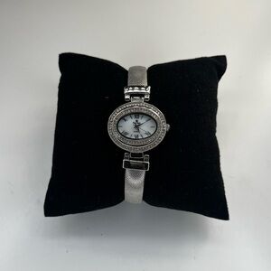 VTG PREMIER DESIGN WRISTWATCH WOMEN SILVER TONE FAUX DIAMONDS QUARTZ NEW BATTERY
